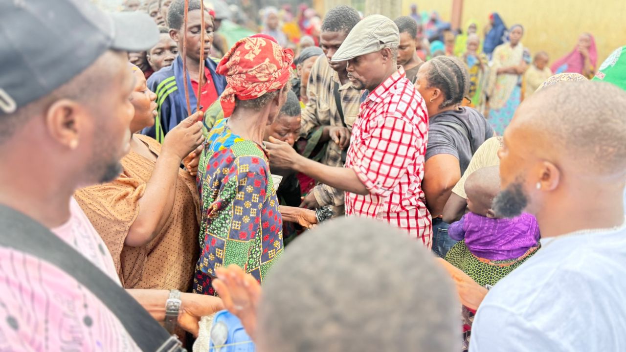 ELIZABETH OSARIEMEN JOHN FOUNDATION community development program in action - local residents participating in sustainable development initiative